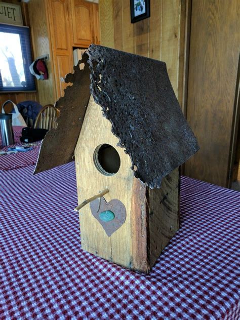 bird houses with metal roofs made of lisies|unique bird houses for sale.